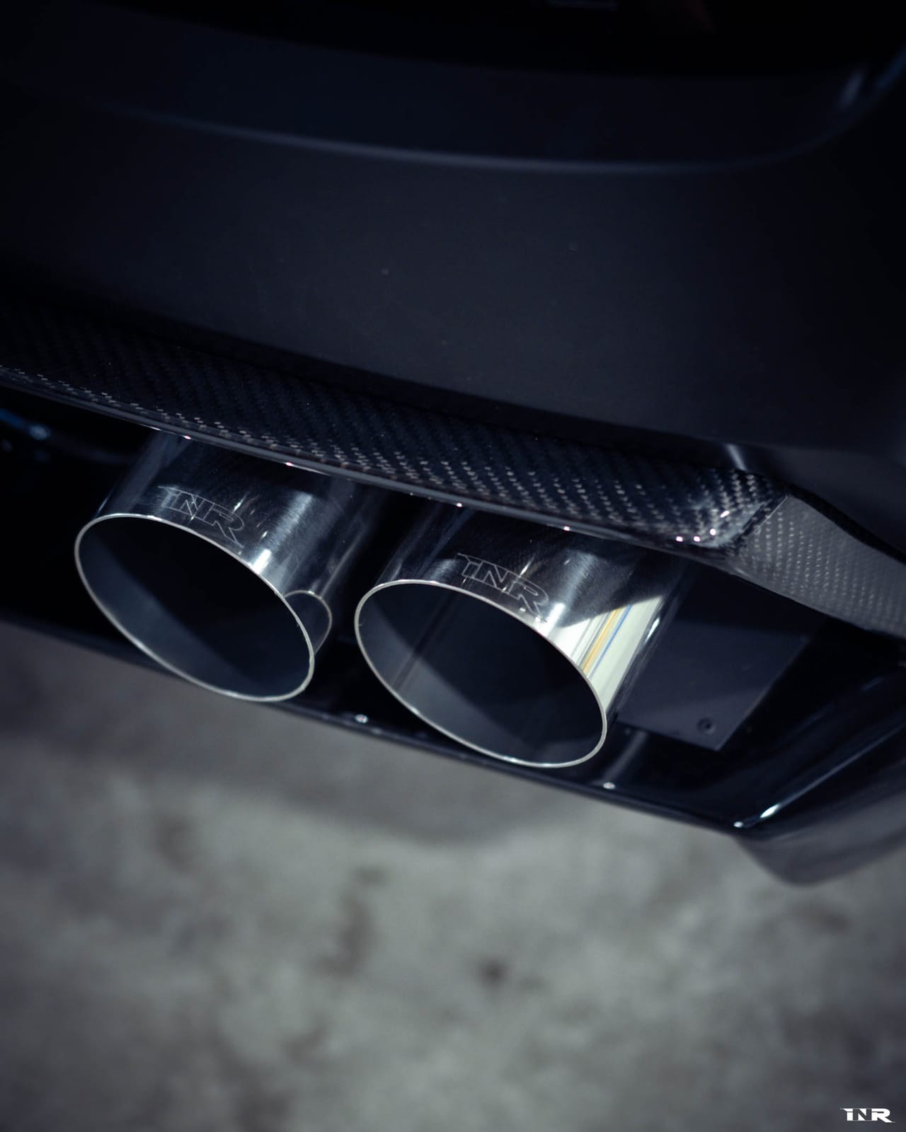 Exhaust detail: INR tips under the carbon diffuser